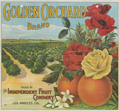 Fruit crate label shows oranges and roses with a crop field in the background