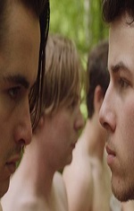 A close up of two young men facing each other. 