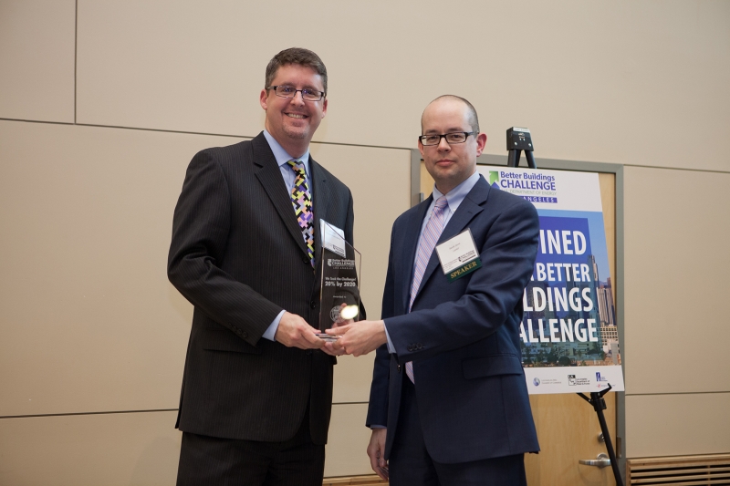 City Librarian John F. Szabo receiving the Energy Innovation Award from David Jacot, Director of Energy Efficiency, Los Angeles Department of Water and Power.