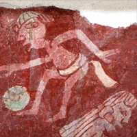 fresco of a boy kicking a ball
