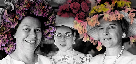 three women in big flowery hats