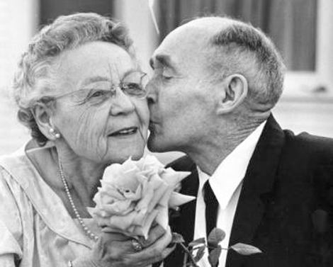 Howard Durst plants a kiss on his wife of 50 years at the couple's golden wedding anniversary yesterday in Sherman Oaks