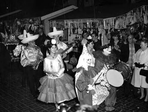 Mardi Gras parade down Olvera Street, 1960s