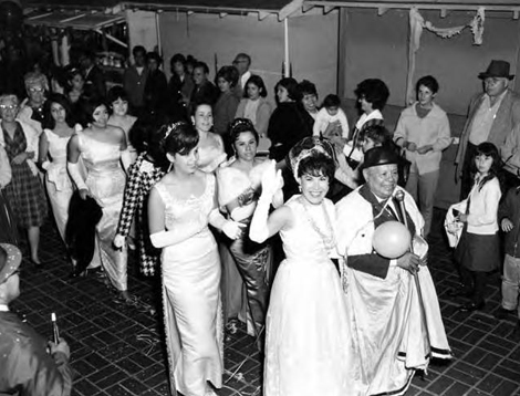 Queen, King of the Mardi Gras and court parading, 1960s