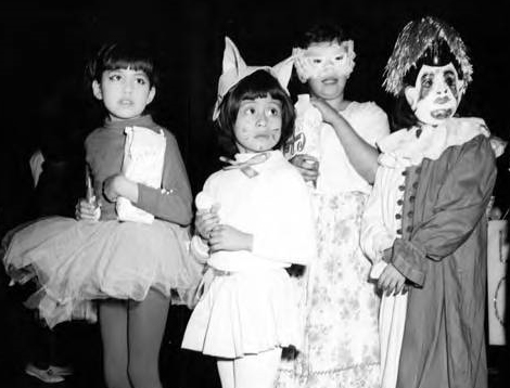 Children in costume for Mardi Gras at the old Plaza and Olvera Street, annually the night before Ash Wednesday