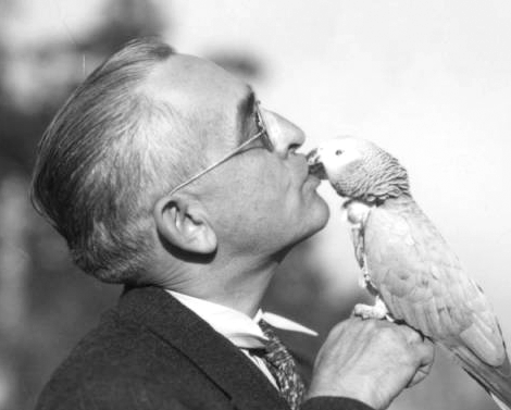Man with parakeet
