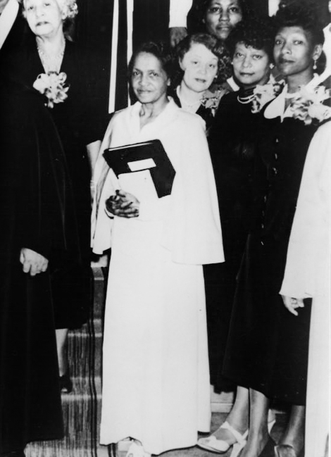 Dr. Maye Jones poses in cap and gown at her graduation in 1957