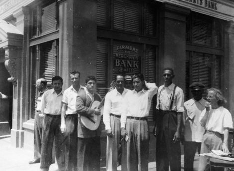 This photo shows the Farmers and Merchants Bank of Watts being picketed in 1948 for not hiring African American or Mexican American tellers