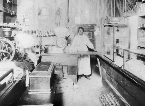 Liney, a  store clerk, stands behind the counter at the Rozier Family Store