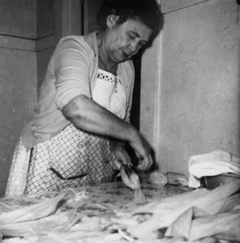 Linda Figueroa prepares tamales for a Christmas dinner