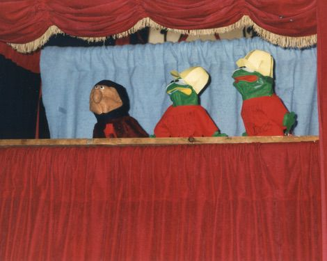 3 puppets on a puppet stage