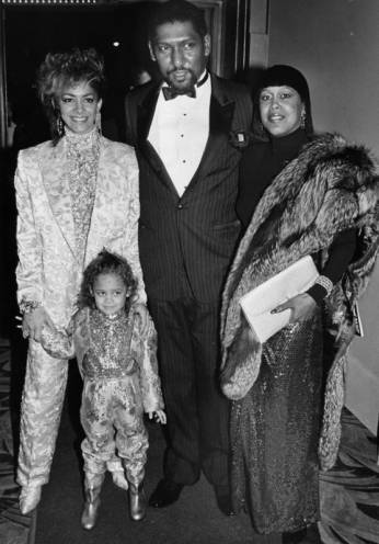 Sheila E. with Willis Edwards and Barbara Warren and a young girl attending the NAACP Image Awards in 1985.