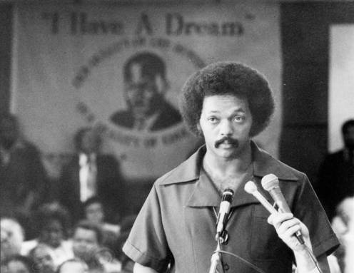 Civil rights leader Jesse Jackson addresses the Los Angeles School Board to improve the quality of education of minority children.