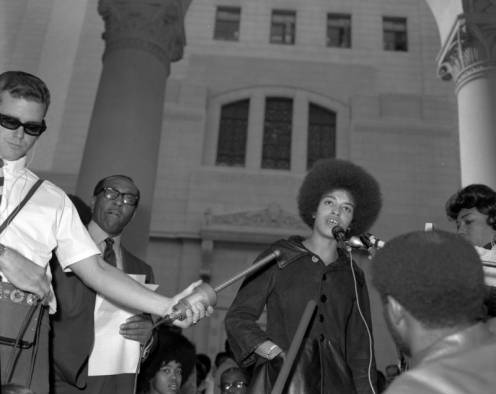 	Angela Davis speaks from the Spring Street steps of City Hall during the community rally.