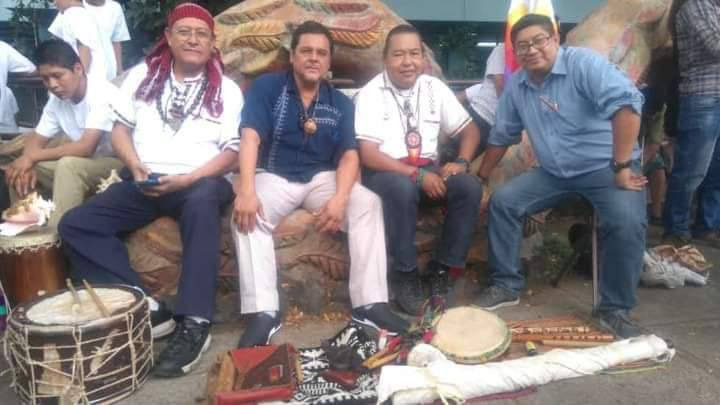 5 musicians on a bench
