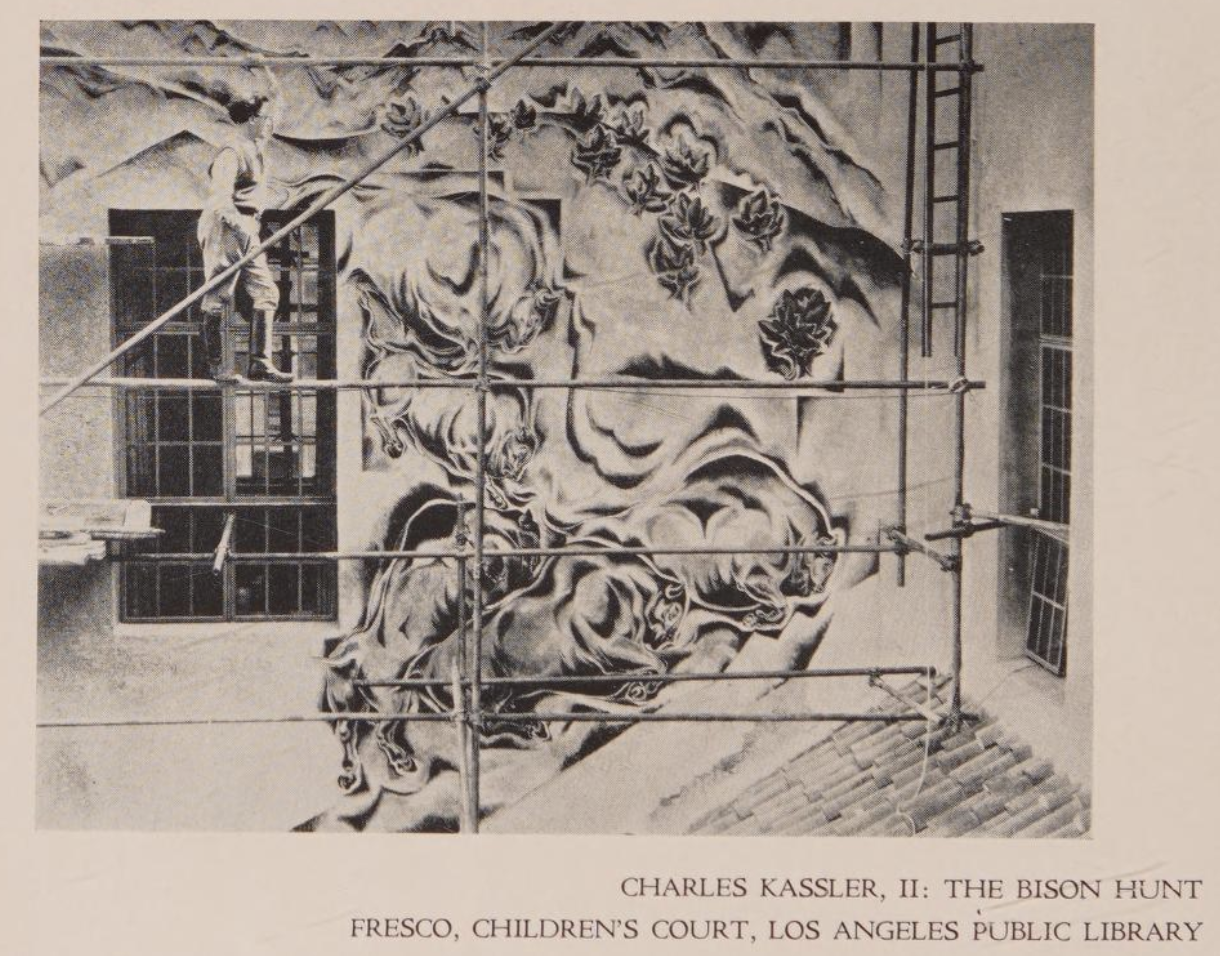 Artist Charles Kassler Jr. on scaffolding in front of Bison Hunt