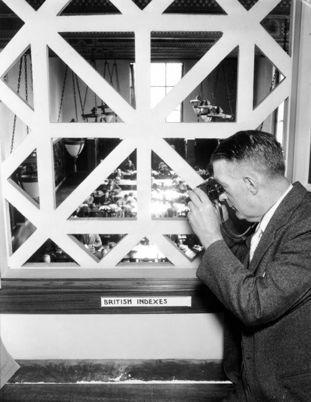 Samuel Wardlaw looking through a window