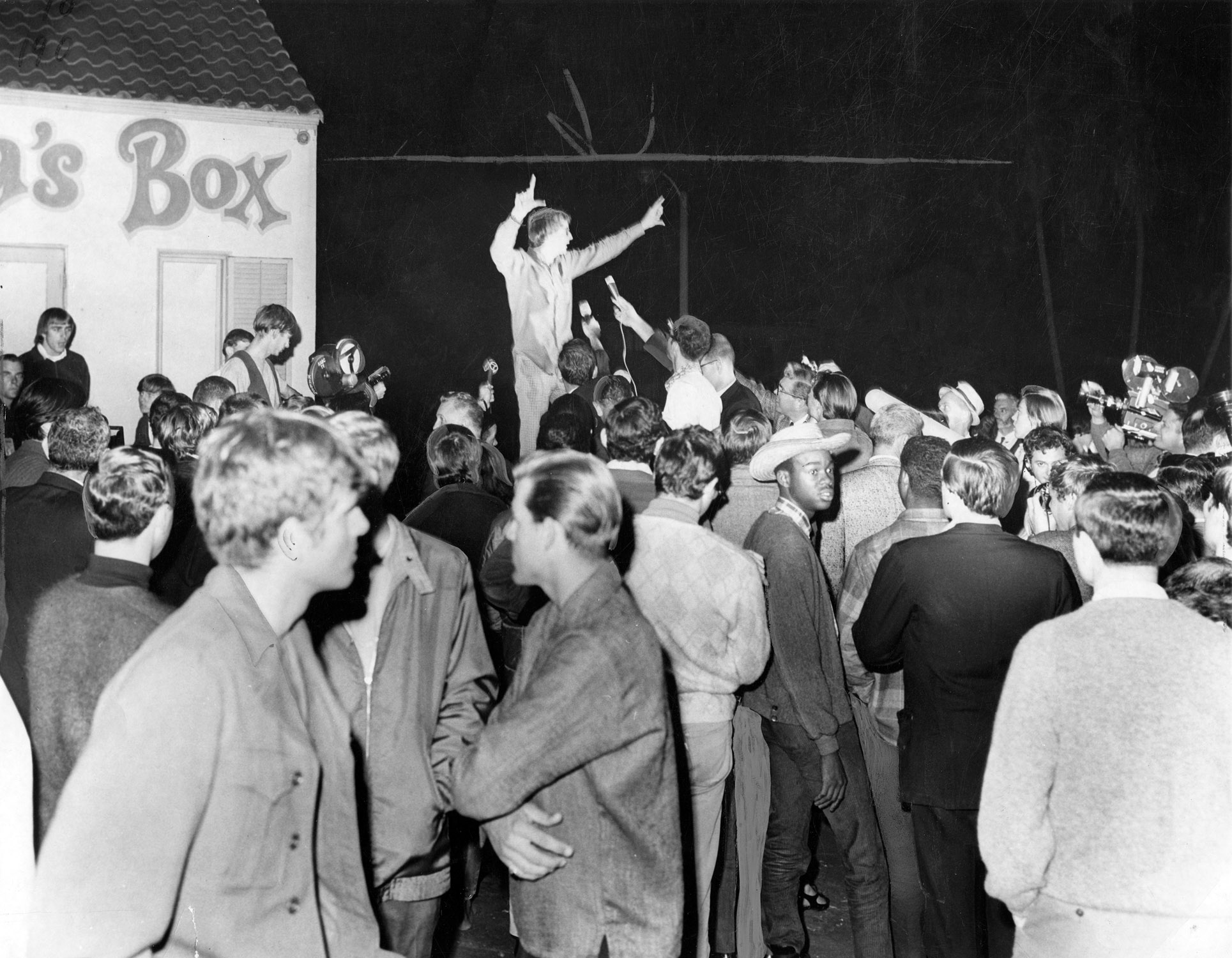 People
gathering in front of Pandora’s Box (1966)