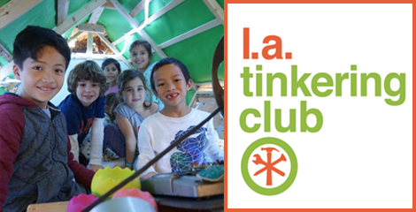 group of kids in a tent structure