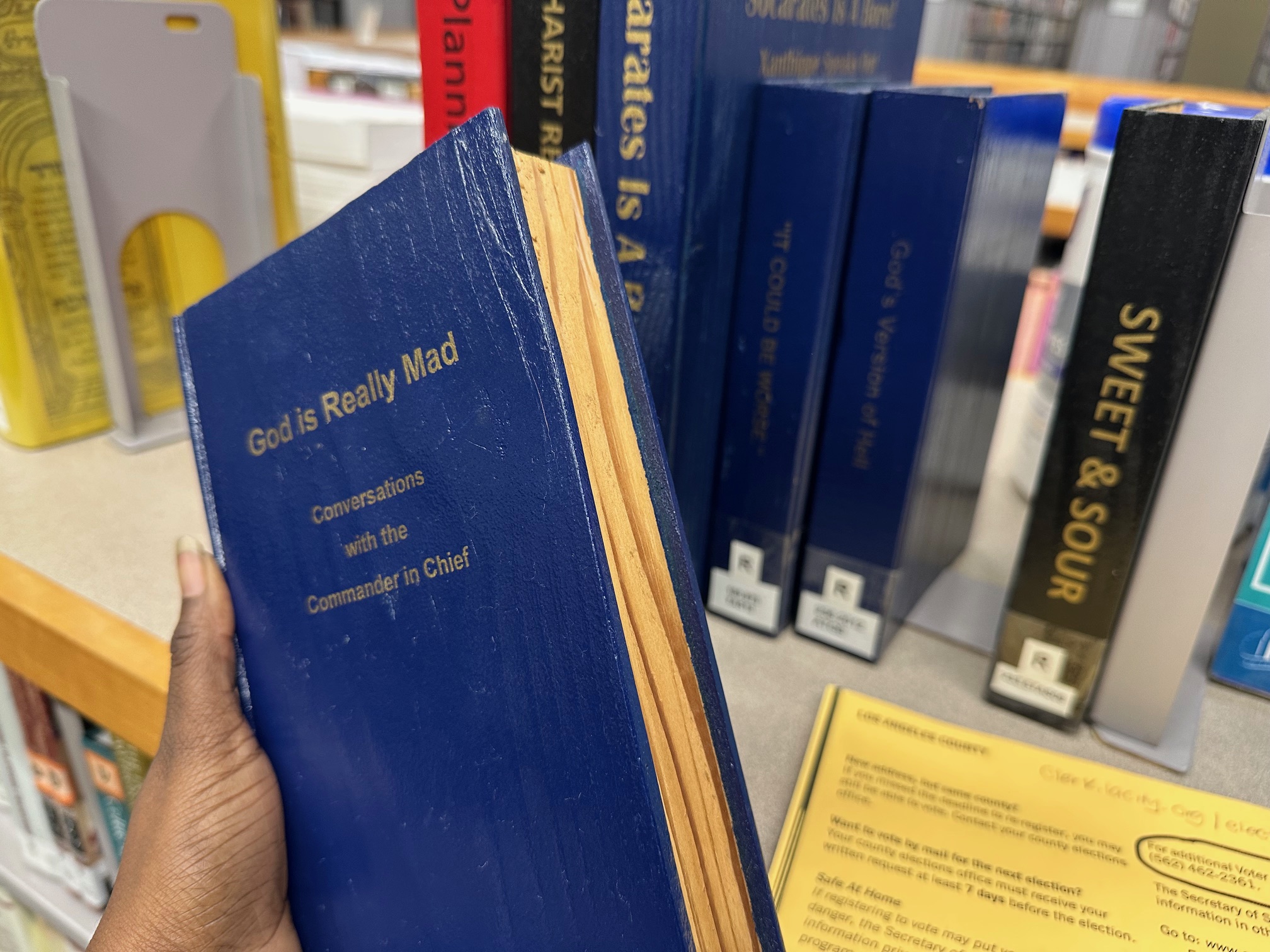 Against the Grain wooden book titled God is Really Mad