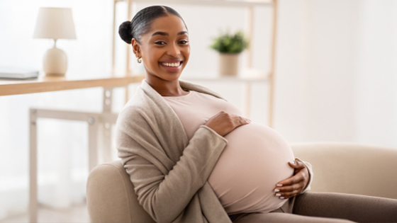 Pregnant woman smiling