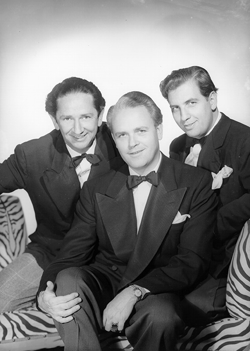 b/w photo of Yale Puppeteers in tuxedos