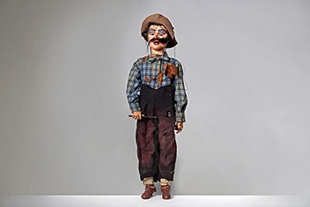 color photo of puppet of Simon Legree