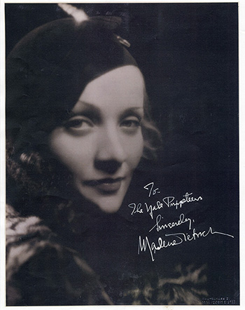 b/w headshot of Marelene Dietrich, signed and inscriped to Yale Puppeteers