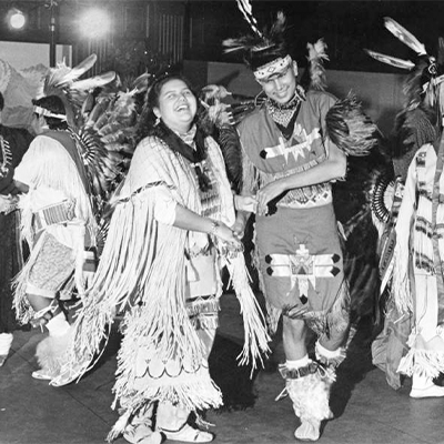 Teo native dancers sharing a laugh.
