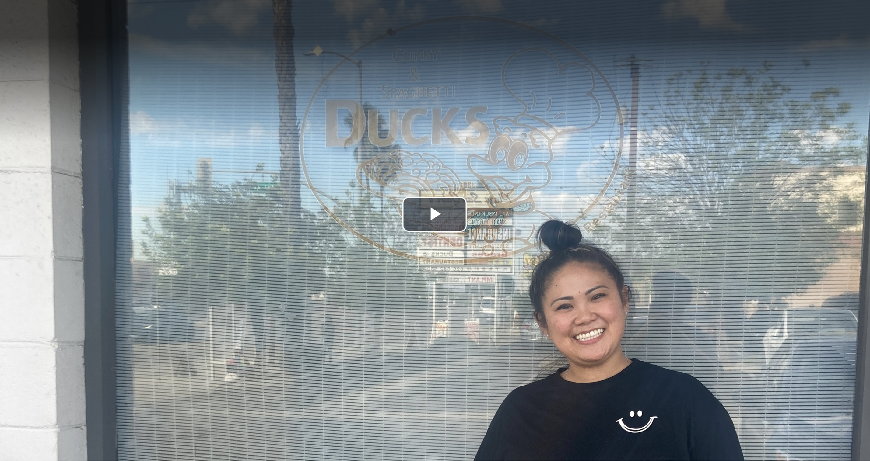 Natsumi Saeki in front of restaurant