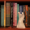 ceramic ghost on a book shelf