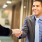 man shaking a hand of another business person after an interview