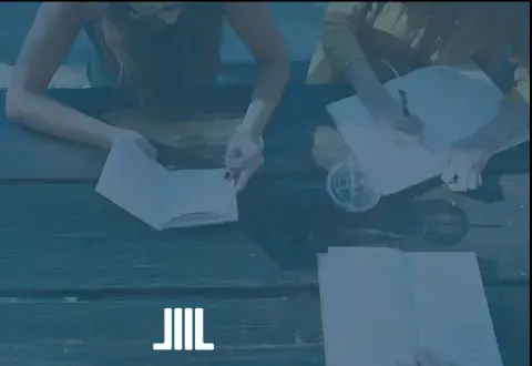 2 girls reading books 