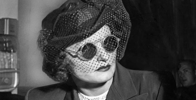 Brenda Allen waits for policewoman Audre Davis to appear at hearing arranged by Judge William McKay. Davis never showed up in court. Herald Examiner Collection, photo dated July 9, 1949