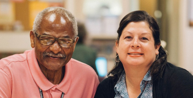 Pictured from left: Learner Mark Clemons and Literacy Coordinator Priscilla Rojas-Naiman