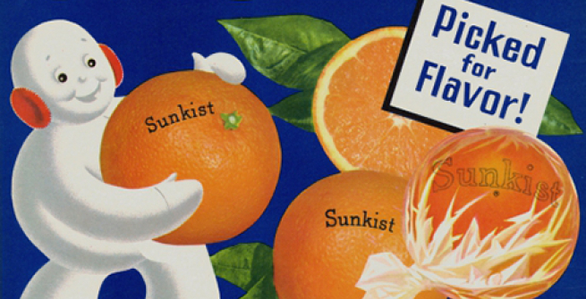 Snowman carrying giant oranges