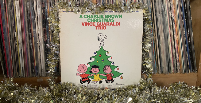 A Charlie Brown Christmas album cover with tinsel decoration