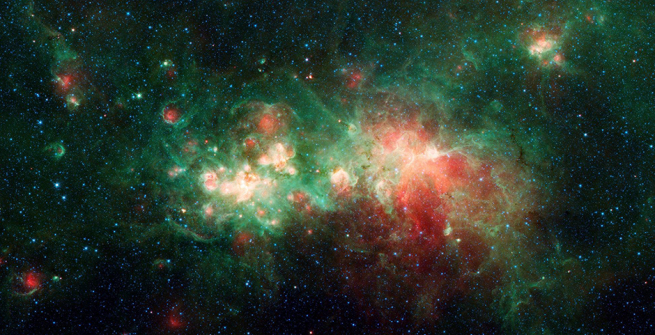 Spitzer Image of Star Factory W51 - The star-forming nebula W51 is one of the largest "star factories" in the Milky Way galaxy.