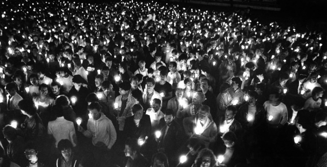 Photograph caption dated May 27, 1983 reads, "Some of the 5,000 people who rallied at Westwood Federal Building in support of more AIDS research funds." 