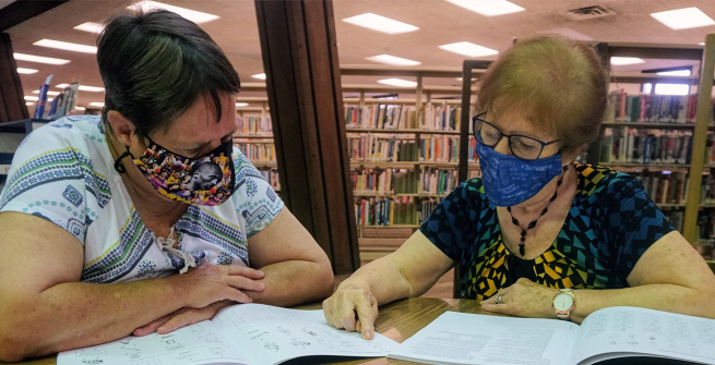 Learner Jamie Ferguson works with her tutor Catalina Gancz