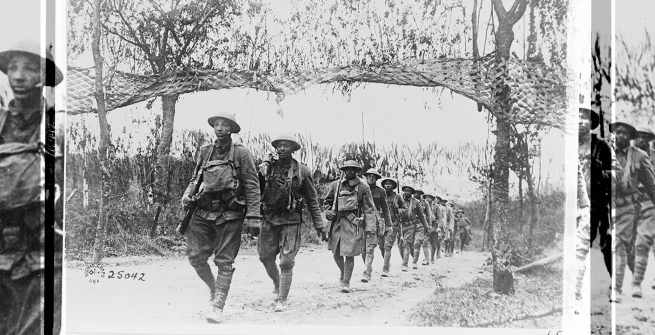 Photo by U.S. Army Signal Corps from Library of Congress [U.S. Army Infantry troops, African American unit, marching northwest of Verdun, France, in World War I]