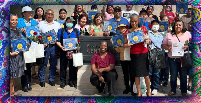 Dr. Hazly and participants pose in front of 5th Street entrance of Central Library