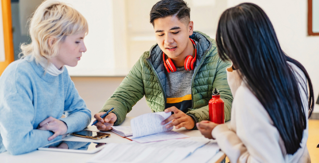 3 teens in a discussion about finances