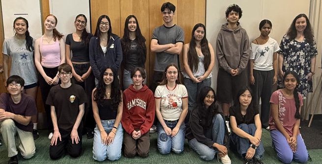 group of 18 teens gathered for a meeting