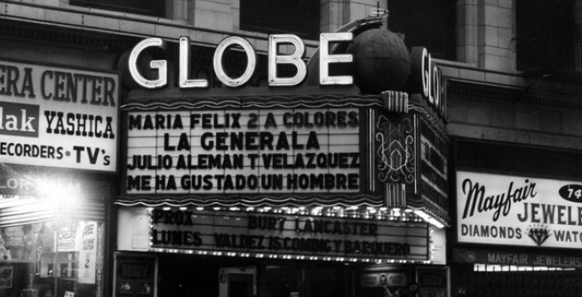 The marquee of the Globe Theater advertises Spanish-language entertainment in the early 1970s.