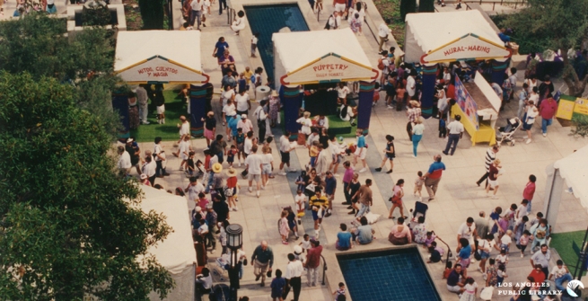 Families fill the Maguire Gardens on Central Library's reopening day 