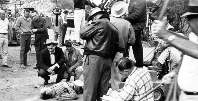 A close-up shot is lined up by the director and cameraman during a Maverick shoot on the Warner Bros. lot in Burbank, [1961]. Valley Times Collection