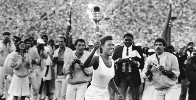 Gina Hemphill running with the olympic torch
