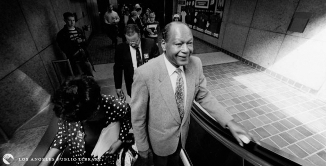 Tom Bradley on an escalator at the opening of the Red Line subway downtown, 1-30-93.