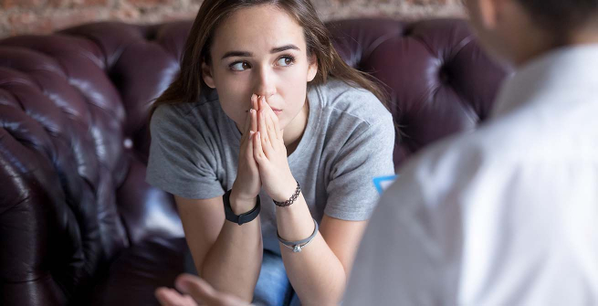 teen girl looking concerned